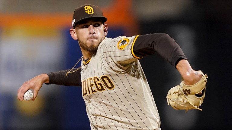 San Diego Padres starting pitcher Joe Musgrove (44) delivers against the New York Mets during the first inning of Game 3 of a National League wild-card baseball playoff series, Sunday, Oct. 9, 2022, in New York. (John Minchillo/AP)
