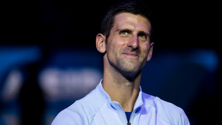 Serbia's Novak Djokovic smiles after winning his final match against Croatian Marin Cilic on October 2, 2022 in Tel Aviv, Israel. Djokovic and Cilic meet at the final match of Tel Aviv Watergen Open. (Amir Levy/Getty Images)