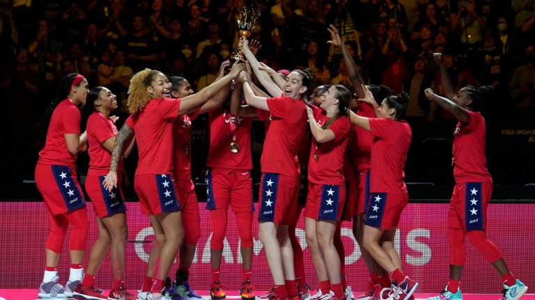 Players from the United States celebrate with with their trophy after defeating China in their gold medal game at the women's Basketball World Cup in Sydney, Australia, Saturday, Oct. 1, 2022. (Rick Rycroft/AP)