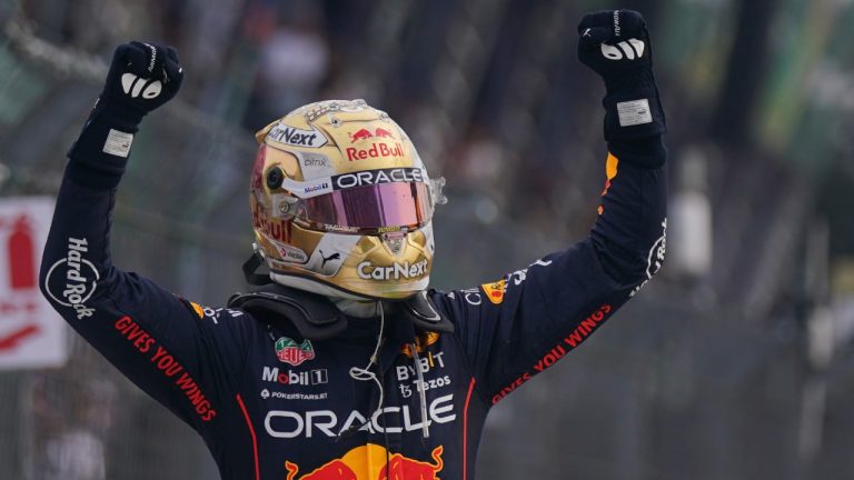 Red Bull driver Max Verstappen, of the Netherlands, celebrates his victory in the Formula One Mexico Grand Prix at the Hermanos Rodriguez racetrack in Mexico City, Sunday, Oct. 30, 2022. (Fernando Llano/AP)