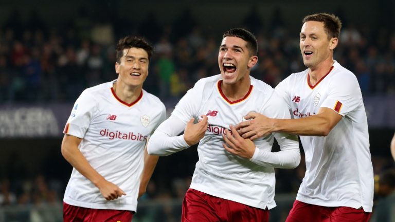 Roma's Cristian Volpato, center, celebrates after scoring his side's second goal during the Serie A soccer match between Hellas Verona and Roma, at the Marcantonio Bentegodi Stadium in Verona, Italy, Monday, Oct. 31, 2022. (Paola Garbuio/LaPresse via AP)