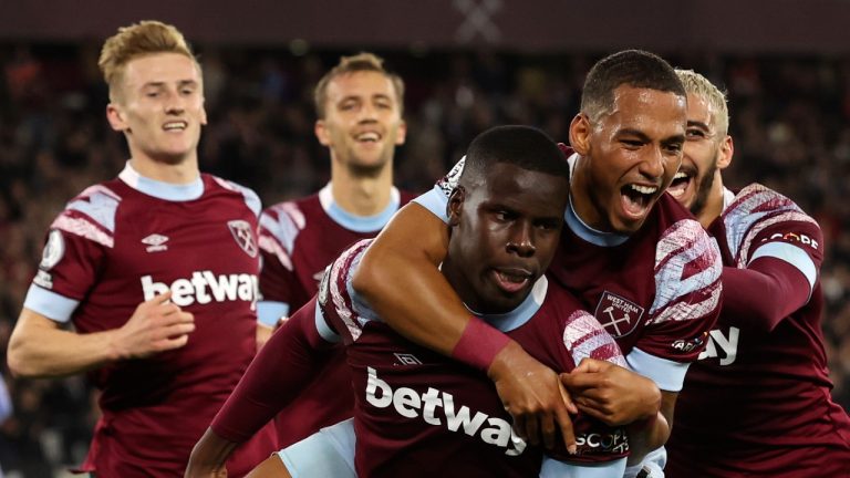 West Ham's Kurt Zouma, center, celebrates with teammates after scoring his sides first goal during the English Premier League soccer match between West Ham United and Bournemouth at the London Stadium in London, England, Monday, Oct. 24, 2022. (AP Photo/Ian Walton)