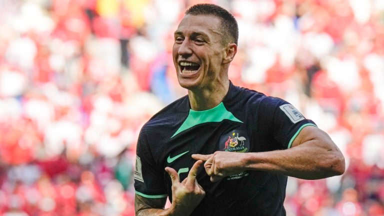 Australia's Mitchell Duke celebrates after he scored the opening goal during the World Cup group D soccer match between Tunisia and Australia at the Al Janoub Stadium in Al Wakrah, Qatar, Saturday, Nov. 26, 2022. (Luca Bruno/AP)