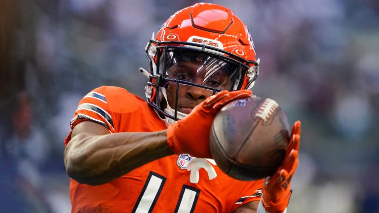 Chicago Bears' Darnell Mooney warms up before an NFL football game against the Dallas Cowboys Sunday, Oct. 30, 2022, in Arlington, Texas. (Nam Y. Huh/AP)
