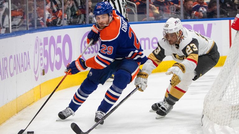 Vegas Golden Knights' Alec Martinez (23) chases Edmonton Oilers' Leon Draisaitl (29) during second period NHL action in Edmonton on Saturday, November 19, 2022. (Jason Franson/CP)
