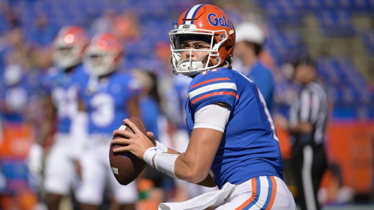 Florida quarterback Jalen Kitna (11) warms up before an NCAA college football game against Eastern Washington, Sunday, Oct. 2, 2022, in Gainesville, Fla. Florida backup quarterback Jalen Kitna, the son of retired NFL quarterback Jon Kitna, was arrested Wednesday, Nov. 30, 2022 and charged with two counts of distribution of child exploitation material and three counts of possession of child pornography. (AP Photo/Phelan M. Ebenhack)