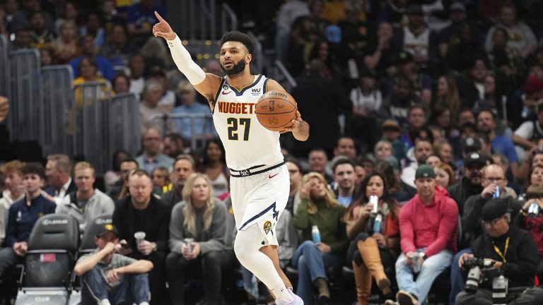 Denver Nuggets guard Jamal Murray sets up a play against the Utah Jazz during the first quarter of an NBA basketball game Friday, Oct. 28, 2022, in Denver. (Jack Dempsey/AP)