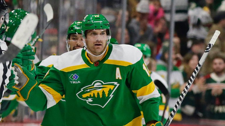 Minnesota Wild left wing Marcus Foligno celebrates his goal with the bench in the second period during an NHL hockey game against the Winnipeg Jets Wednesday, Nov. 23, 2022, in St. Paul, Minn. (Andy Clayton-King/AP)
