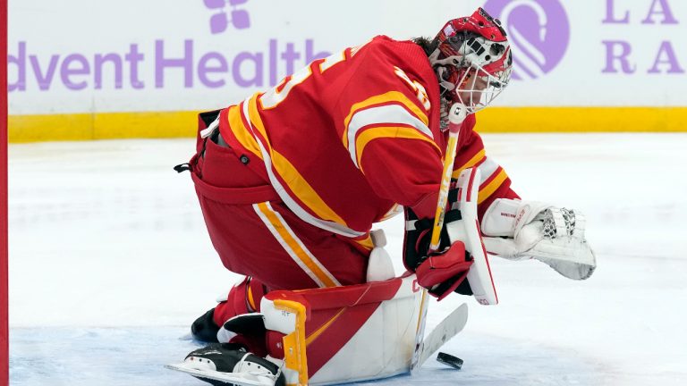 Calgary Flames goaltender Jacob Markstrom (25) makes a save on a shot by the Tampa Bay Lightning during the second period of an NHL hockey game Thursday, Nov. 17, 2022, in Tampa, Fla. (Chris O'Meara/AP)