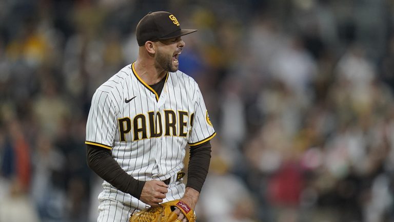 San Diego Padres relief pitcher Nick Martinez reacts after getting the last out against the San Francisco Giants, Tuesday, Oct. 4, 2022, in San Diego. (Gregory Bull/AP)