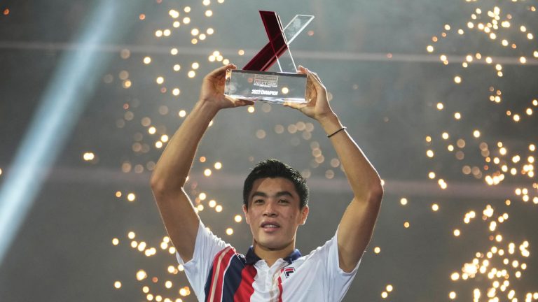Winner: United States' Brandon Nakashima holds a trophy during a medal ceremony for the ATP Next Gen tennis tournament after a final match against Czech Republic's Jiri Lehecka in Milan, Italy, Saturday, Nov. 12, 2022. (Luca Bruno/AP)