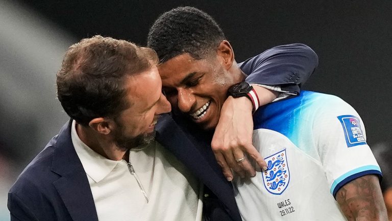 England's Marcus Rashford, right, is greeted by England's head coach Gareth Southgate as he leaves the pitch during the World Cup match between England and Wales, at the Ahmad Bin Ali Stadium in Al Rayyan , Qatar, Tuesday, Nov. 29, 2022. (Frank Augstein/AP Photo)