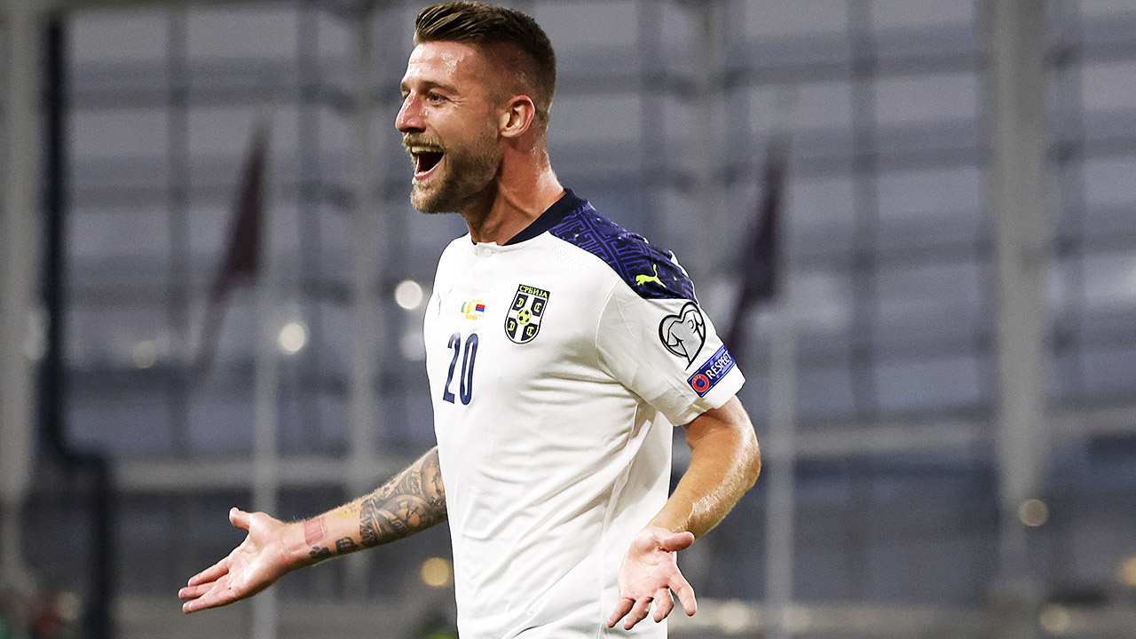 Serbia's Sergej Milinkovic-Savic celebrates after scoring his side's opening goal in a World Cup qualifying match. (Peter Morrison/AP)