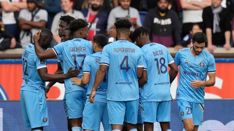 Troyes' Mama Baldé
celebrates with this teammates after scoring his side's opening goal the French League One soccer match between Paris Saint-Germain and Troyes at the Parc des Princes in Paris, France, Saturday, Oct. 29, 2022. (Francois Mori/AP)