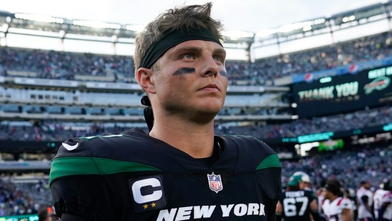 New York Jets quarterback Zach Wilson walks off the field after losing to the New England Patriots 22-17 Sunday, Oct. 30, 2022, in New York. (John Minchillo/AP Photo)