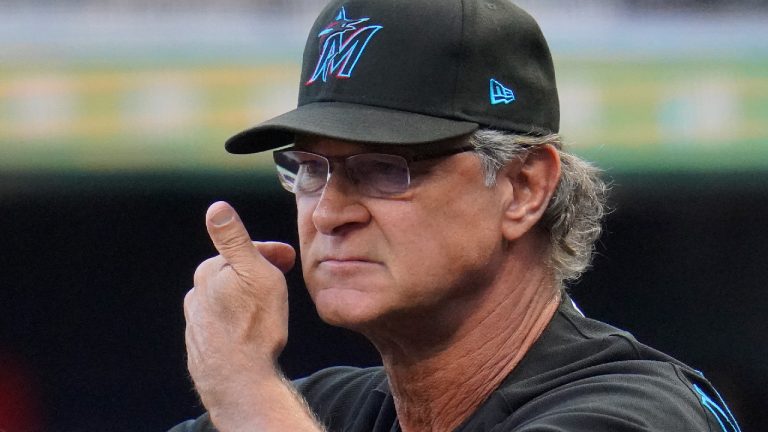 Miami Marlins manager Don Mattingly stands in the dugout during the first inning of a baseball game against the Pittsburgh Pirates in Pittsburgh, Saturday, July 23, 2022. (Gene J. Puskar/AP)