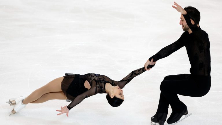 Deanna Stellato-Dudek and Maxime Deschamps perform in the pairs short program during the Grand Prix Skate America Series, Friday, Oct. 21, 2022, in Norwood, Mass. (Michael Dwyer/AP Photo)