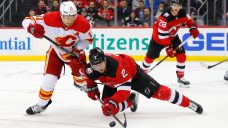 Flames lose sixth in a row, fall just short against surging Devils