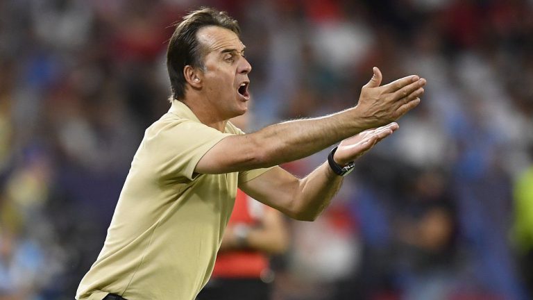 Sevilla's head coach Julen Lopetegui gestures from the touchline during the group G Champions League soccer match between Sevilla and Manchester City in Seville, Spain, on Sept. 6, 2022. Premier League club Wolverhampton hired Julen Lopetegui as manager on Saturday, Nov. 5, 2022. Lopetegui was fired one month ago by Sevilla after three years with the Spanish club during which he led it to a Europa League title in 2020. The 56-year-old Lopetegui will take over Nov. 14, subject to being granted work permits, following the team's final game before the World Cup break. (Jose Breton/AP)