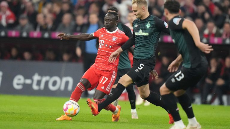 Bayern's Sadio Mane, centre, and Bremen's Amos Pieper, second from right, challenge for the ball during the Bundesliga soccer match between Bayern Munich and Werder Bremen at the Allianz Arena in Munich, Germany, Tuesday, Nov. 8, 2022. (Matthias Schrader/AP)