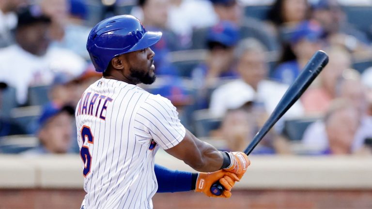 New York Mets' Starling Marte watches his RBI single against the Los Angeles Dodgers during the seventh inning of a baseball game Thursday, Sept. 1, 2022, in New York. (Adam Hunger/AP)