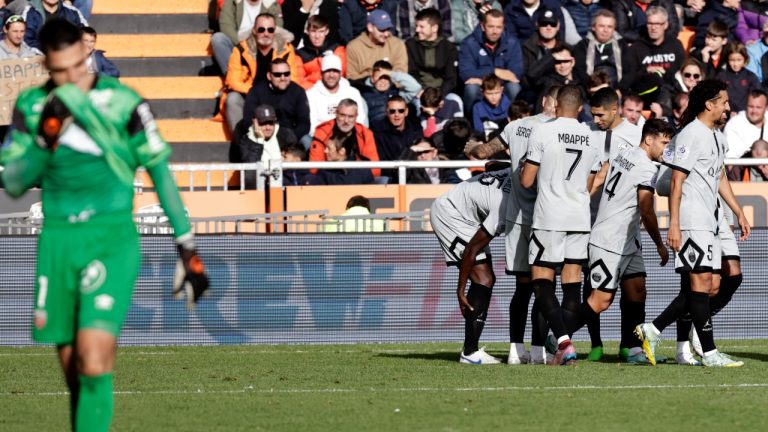 PSG's Danilo Pereira celebrates with teammates after scoring his side's second goal during the French League One soccer match between FC Lorient and Paris Saint-Germain at the Moustoir stadium in Lorient, western France, Sunday, Nov. 6, 2022. (Jeremias Gonzalez/AP)