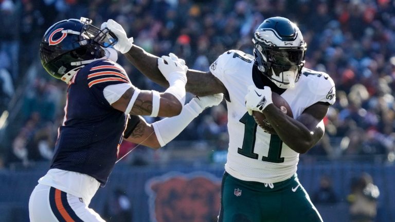 Philadelphia Eagles' A.J. Brown, right, tries to get past Chicago Bears' Jaquan Brisker during the first half of an NFL football game against the Chicago Bears, Sunday, Dec. 18, 2022, in Chicago. (Nam Y. Huh/AP)