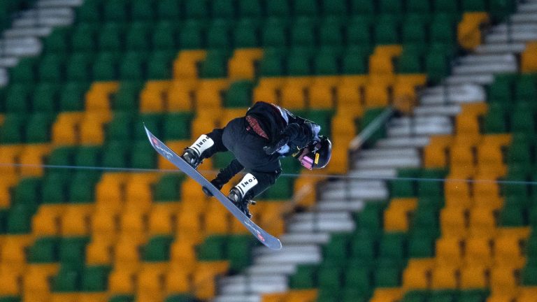Jasmine Baird, of Canada, makes her jump in The Style Experience FIS Snowboard Big Air World Cup finals in Edmonton on Friday, December 10, 2022. (Jason Franson/The Canadian Press)