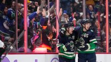 After near scratch, Canucks’ Boeser shines on a ‘night that means a lot’ to his family