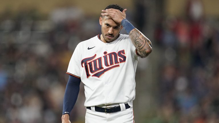 Former Minnesota Twins shortstop Carlos Correa reacts after the bottom of the fifth inning of a baseball game against the San Francisco Giants, Saturday, Aug. 27, 2022, in Minneapolis. (Abbie Parr/AP)
