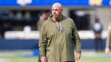 Fired Cardinals coach hires law firm, requests arbitration