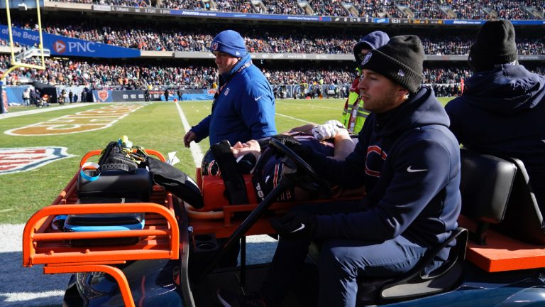 Chicago Bears' Teven Jenkins is carted off the field after an injury during the first half of an NFL football game against the Philadelphia Eagles, Sunday, Dec. 18, 2022, in Chicago. (Nam Y. Huh/AP)