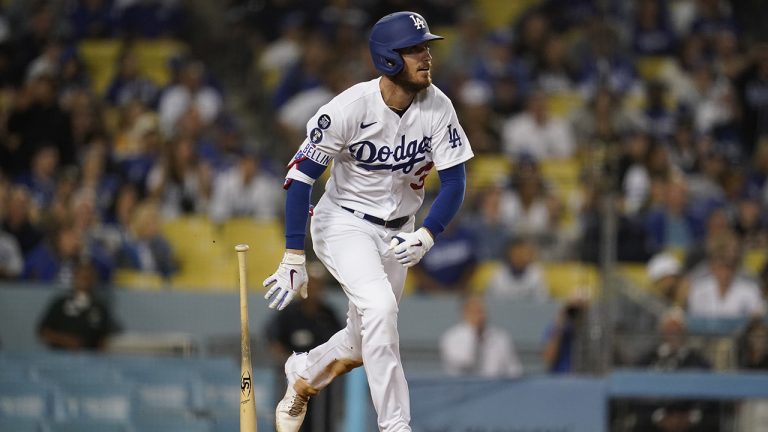 Los Angeles Dodgers' Cody Bellinger watches his RBI single during the eighth inning of a baseball game against the Colorado Rockies Saturday, Oct. 1, 2022, in Los Angeles.(Marcio Jose Sanchez/AP)