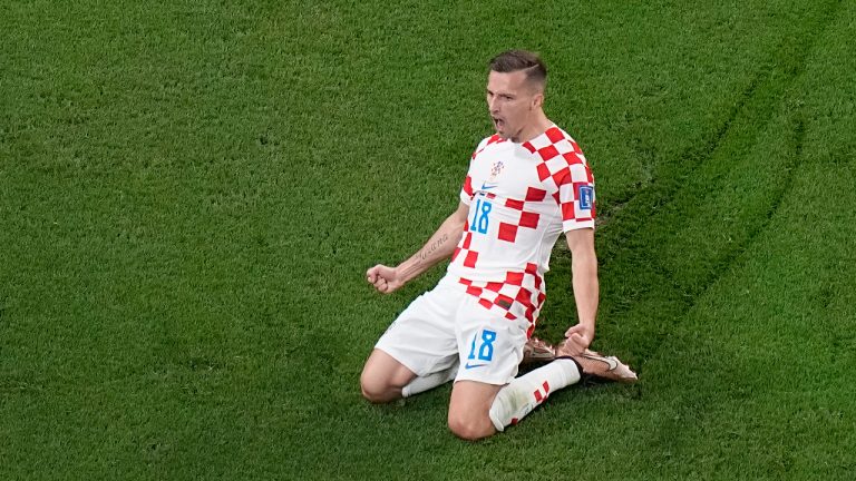 Croatia's Mislav Orsic celebrates after scoring his side's second goal during the World Cup third-place playoff soccer match between Croatia and Morocco at Khalifa International Stadium in Doha, Qatar, Saturday, Dec. 17, 2022. (Pavel Golovkin/AP)