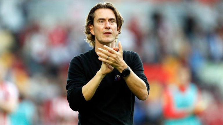 Brentford's head coach Thomas Frank applauds the supporters after the English Premier League soccer match between Brentford and Wolverhampton Wanderers, at the Gtech Community Stadium in London, Saturday, Oct. 29, 2022. (AP Photo)