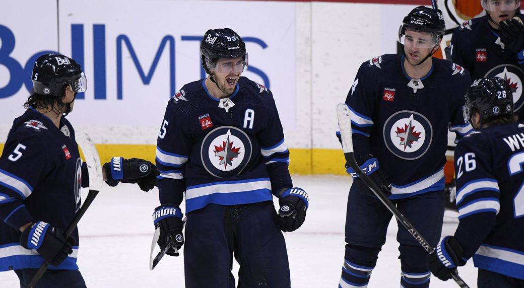 Jets score three goals in third period to complete comeback win