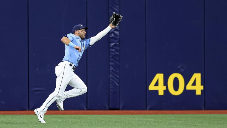 Former Tampa Bay Rays centre fielder Kevin Kiermaier makes a running catch on a line drive by Seattle Mariners' Jesse Winker during the first inning of a baseball game Tuesday, April 26, 2022, in St. Petersburg, Fla. (Mike Carlson/AP)