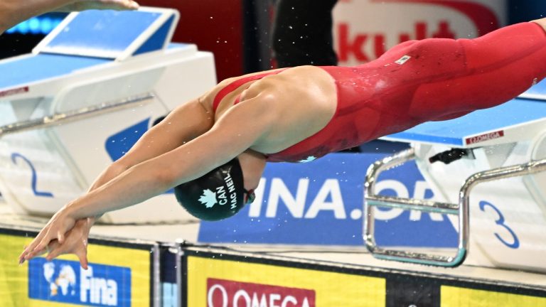 Margaret MacNeil of Canada starts in the women's 50m butterly final during the world swimming short course championships in Melbourne, Australia, Wednesday, Dec. 14, 2022. (Asanka Brendon Ratnayake/AP)