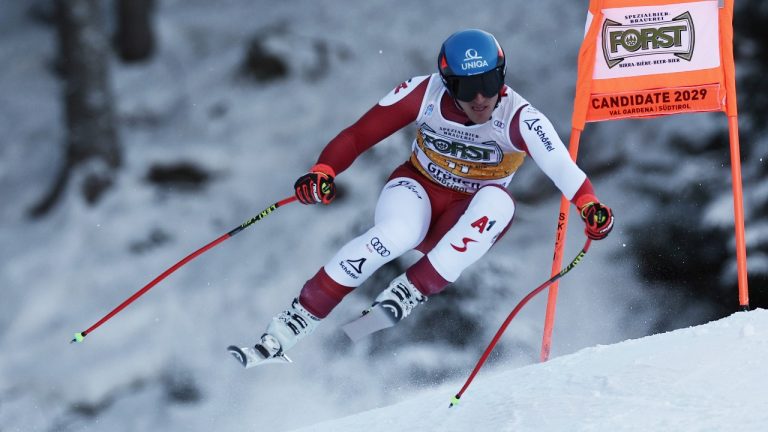 Austria's Matthias Mayer speeds down the course during an alpine ski, men's World Cup downhill race, in Val Gardena, Italy, Saturday, Dec. 17, 2022. (Gabriele Facciotti/AP)