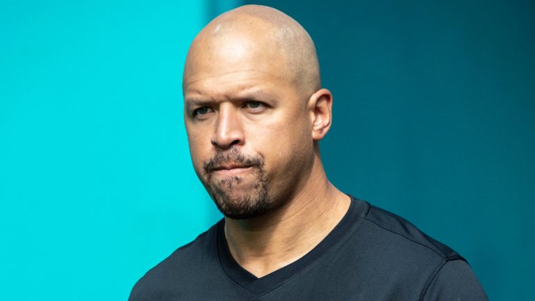 New York Jets wide receivers coach Miles Austin walks onto the field before an NFL football game against the Miami Dolphins, Dec. 19, 2021, in Miami Gardens, Fla. Austin has been suspended by the NFL for violating the league's gambling policy. NFL spokesman Brian McCarthy confirmed Friday, Dec. 23, 2022, the suspension, which Austin is appealing. (Doug Murray/AP)