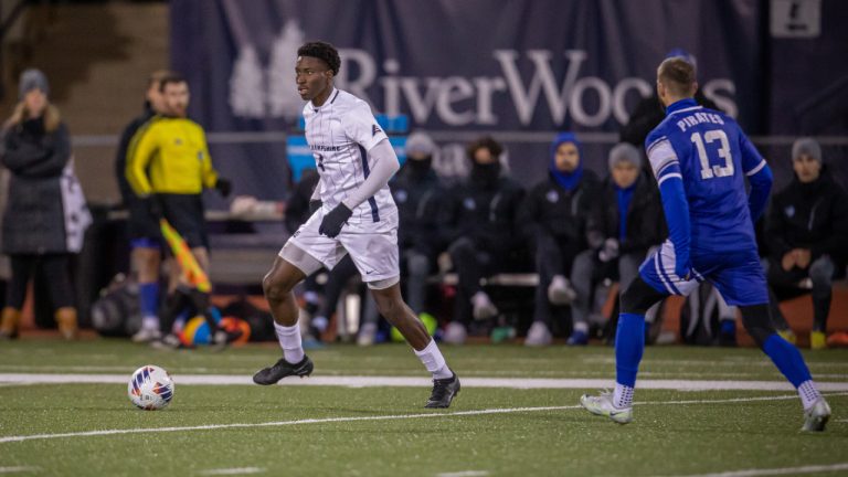 University of New Hampshire's Moise Bambito, of Montreal, carries the ball in this undated handout photo. Montreal's Moise Bombito, a junior defender at the University of New Hampshire, has been selected third overall by the Colorado Rapids at the MLS SuperDraft. (CP/HO, Stu Horne, UNH Athletics)