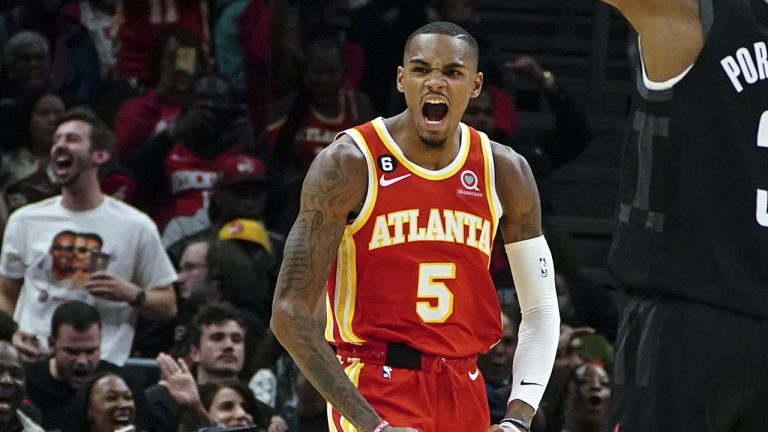 Atlanta Hawks guard Dejounte Murray reacts after a basket against the Houston Rockets during the second half of an NBA basketball game Wednesday, Oct. 19, 2022, in Atlanta. (John Bazemore/AP)