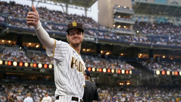 San Diego Padres first baseman Wil Myers reacts to fans before Game 3 of a baseball NL Division Series against the Los Angeles Dodgers, Friday, Oct. 14, 2022, in San Diego. (Ashley Landis/AP)