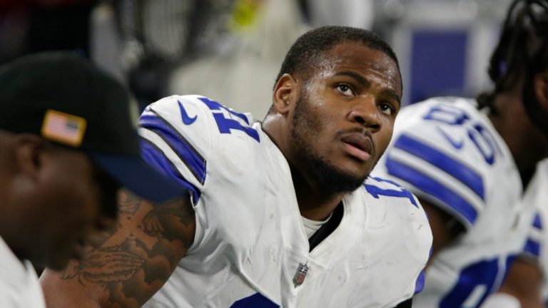 Dallas Cowboys linebacker Micah Parsons sits on the bench during the first half of an NFL football game against the Minnesota Vikings, Sunday, Nov. 20, 2022, in Minneapolis. (Andy Clayton-King/AP Photo)