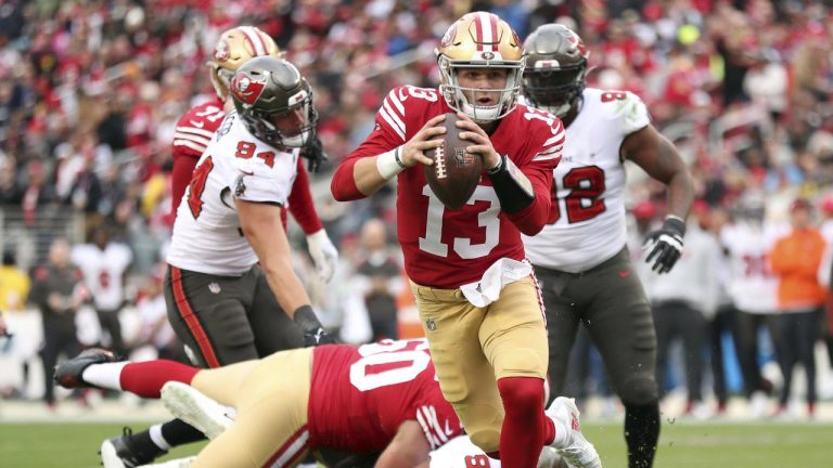 San Francisco 49ers' Brock Purdy rushes for a touchdown against the Tampa Bay Buccaneers during the second quarter of an NFL football game at Levi's Stadium in Santa Clara, Calif., Sunday, Dec. 11, 2022. (Scott Strazzante/San Francisco Chronicle via AP)
