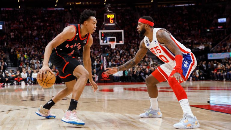 Toronto Raptors forward Scottie Barnes (4) dribbles against Brooklyn Nets forward Royce O'Neale (00) during the first half of their NBA game in Toronto on Friday, Dec. 16, 2022. (Cole Burston/CP)