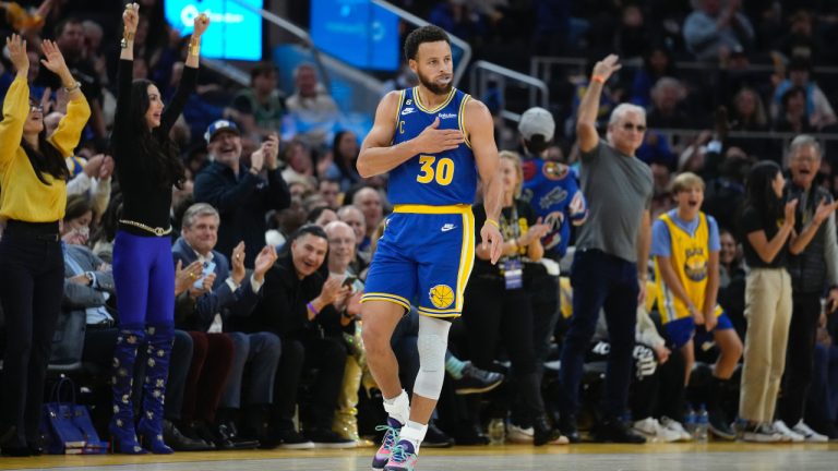 Golden State Warriors guard Stephen Curry celebrates his 3-point basket against the Boston Celtics during the first half of an NBA basketball game in San Francisco, Saturday, Dec. 10, 2022. (Godofredo A. Vásquez/AP)