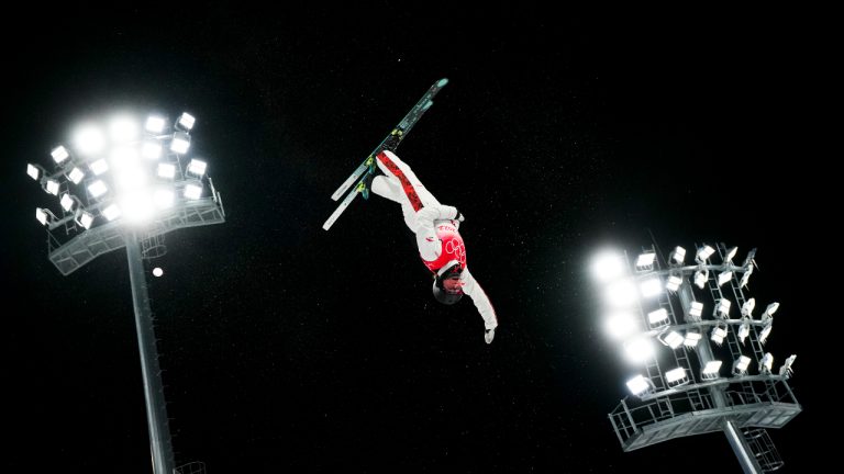 Marion Thenault of Canada warms up prior to competing in the freestyle skiing women’s aerials final 1 during the Beijing Winter Olympic Games, in Zhangjiakou, China, Monday, Feb. 14, 2022. (Sean Kilpatrick/CP)