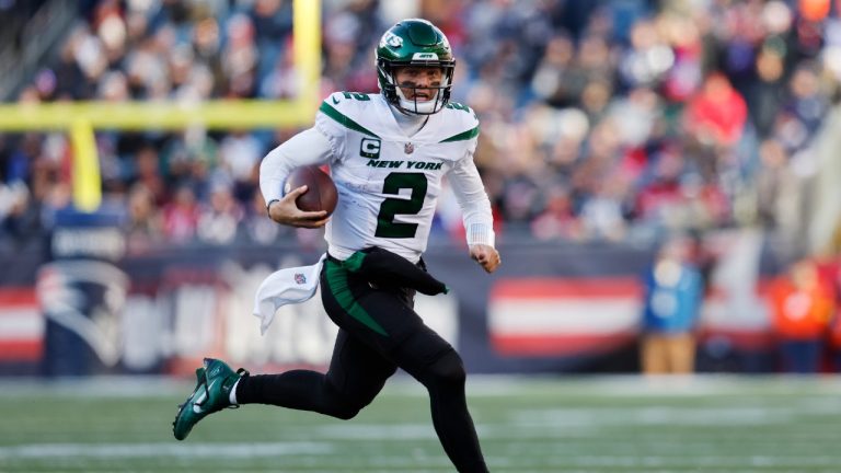 New York Jets quarterback Zach Wilson (2) runs for a gain during the first half of an NFL football game against the New England Patriots, Sunday, Nov. 20, 2022, in Foxborough, Mass. (Michael Dwyer/AP)
