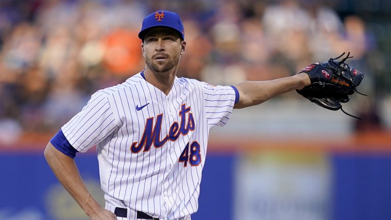 New York Mets starting pitcher Jacob deGrom prepares to throw in the first inning of a baseball game against the Philadelphia Phillies, Saturday, Aug. 13, 2022, in New York. (John Minchillo/AP)